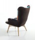 Poltrona moderna patchwork con gambe in legno