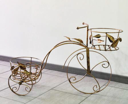 Bicicletta porta vaso in ferro battuto